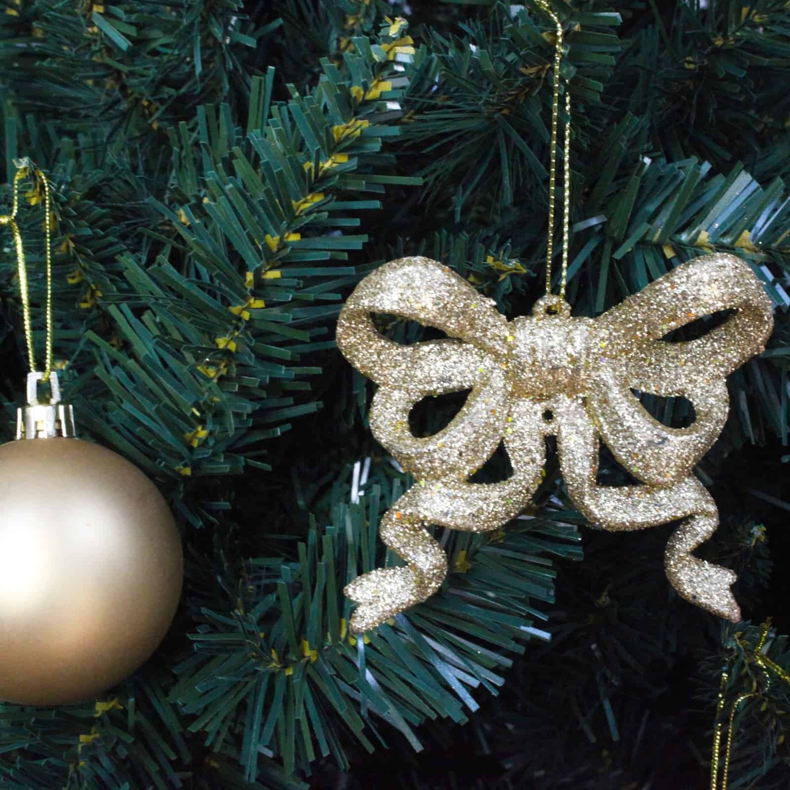 10 CHAMPAGNE GLITTER BOWS 95mm